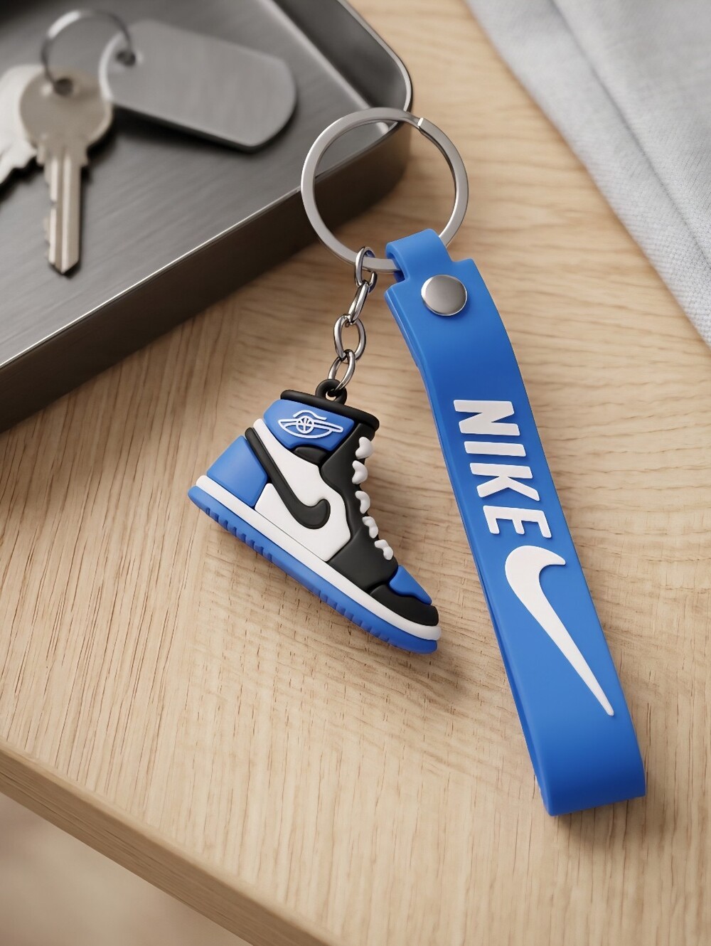 Nike Blue and Black Mini Sneaker Keychain with Branded Strap
